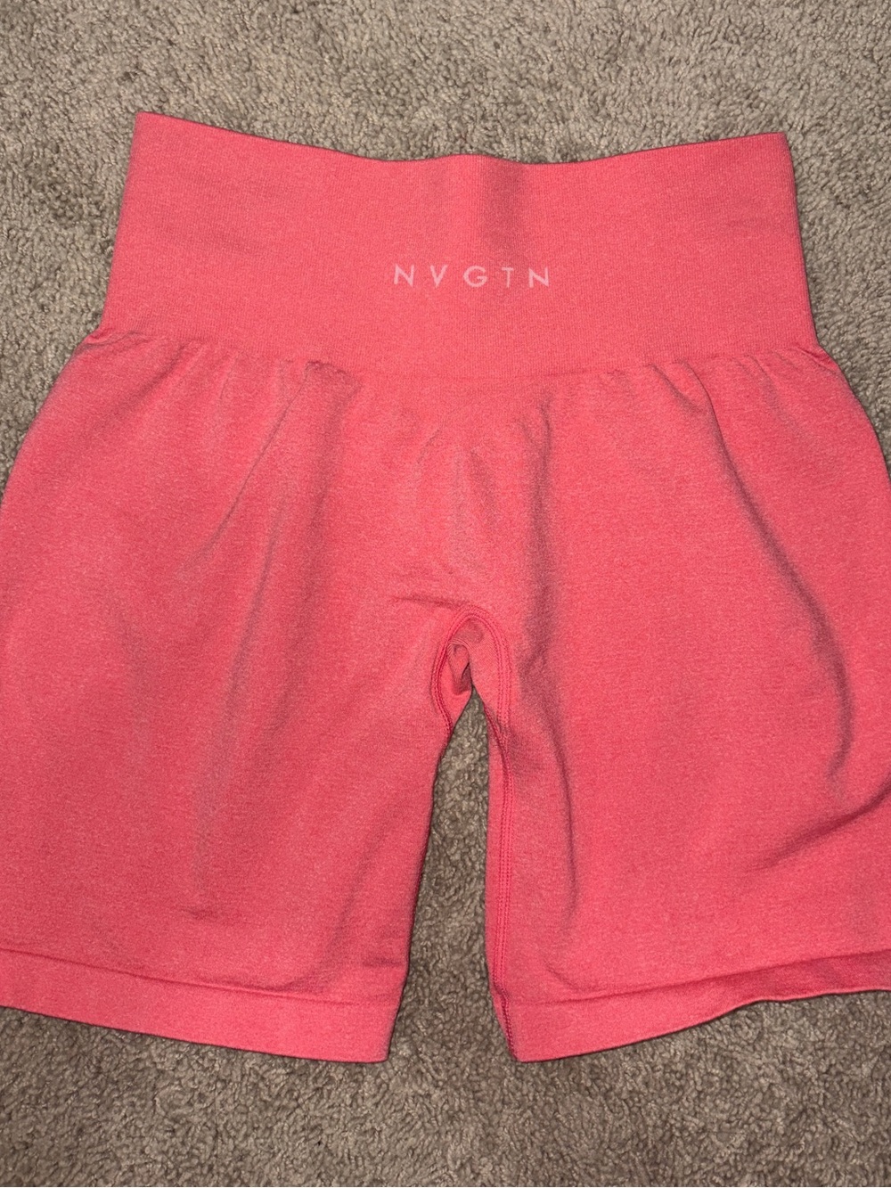 NVGTN Pro Seamless Shorts in Coral/Guava.